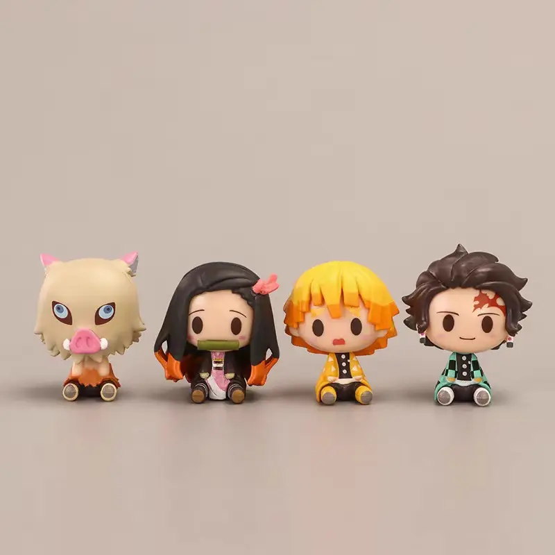 Set de 4 piezas de Demon Slayer en estilo chibi en posición sentada